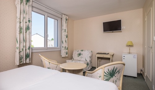 Habitación Confort con 1 cama doble o 2 individuales