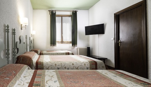 Habitación Doble con Sofá Cama