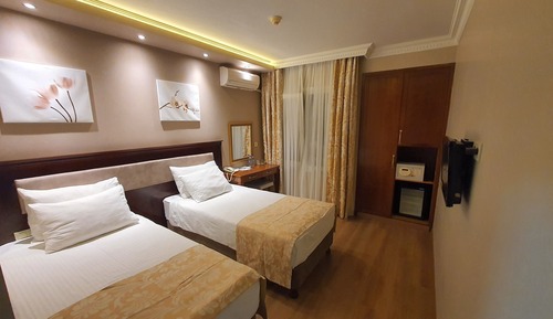 Habitación estándar con 1 cama doble o 2 individuales