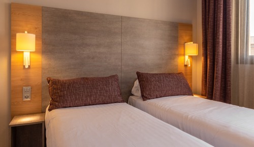 Habitación estándar con 2 camas individuales, en la zona del patio