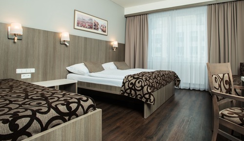 Habitación triple Deluxe (90 min Water and sauna world Access)