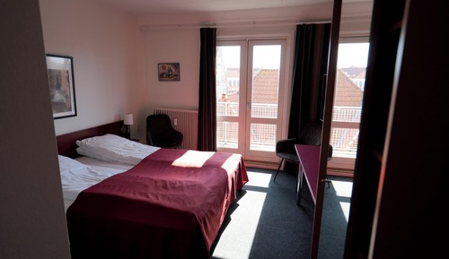 Habitación básica, en edificio anexo