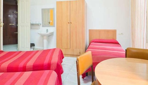 Habitación triple, baño compartido