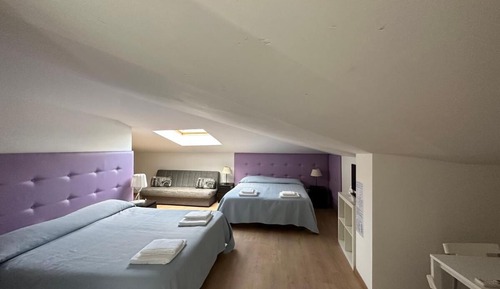Habitación cuádruple abuhardillada