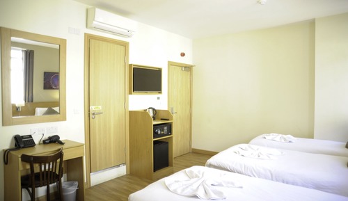 Habitación familiar, varias camas