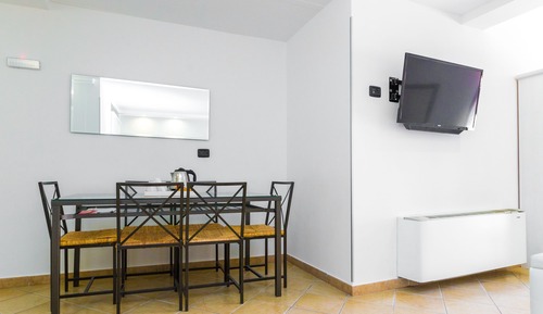 Habitación triple, varias camas