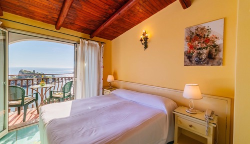 Habitación superior, vistas al mar, en una planta alta