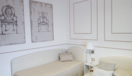 Habitación triple, vistas al mar