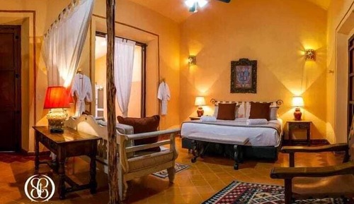 Habitación superior, varias camas