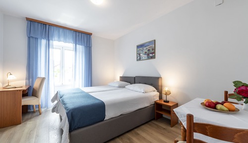 Habitación con 2 camas individuales, terraza, vistas al jardín