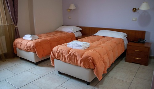 Habitación Confort con 1 cama doble o 2 individuales