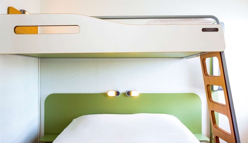 Habitación triple, varias camas
