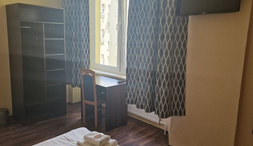 Habitación con 1 cama doble o 2 individuales, baño compartido