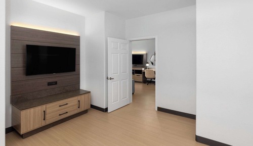 Suite Deluxe, 1 cama de matrimonio grande, no fumadores (Mobility,Hearing,Roll-In Shower)