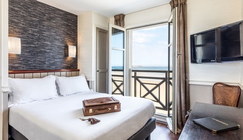 Habitación triple, vistas al mar