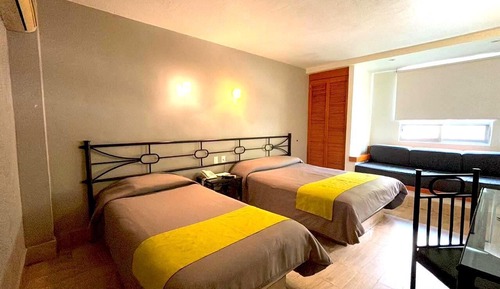 Habitación triple ejecutiva