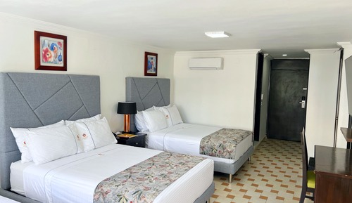 Habitación superior con 1 cama doble o 2 individuales