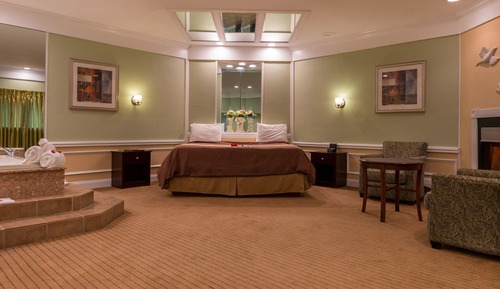 Suite Deluxe, 1 cama de matrimonio grande, bañera de hidromasaje (Fireplace)