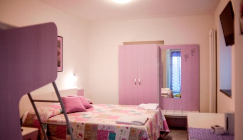 Habitación familiar, varias camas