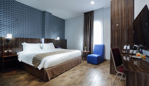 Habitación superior con 1 cama doble o 2 individuales