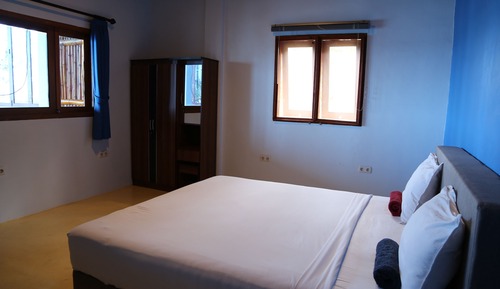 Habitación Deluxe doble, 1 cama de matrimonio grande, vistas parciales al mar, junto a la playa