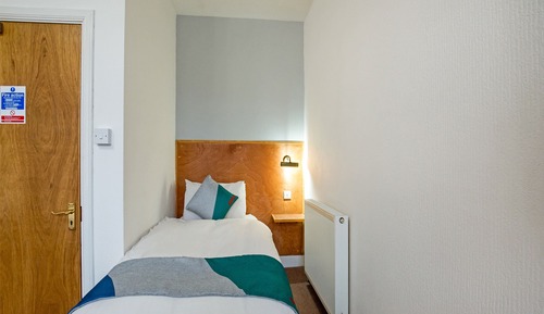 Habitación triple Deluxe, varias camas