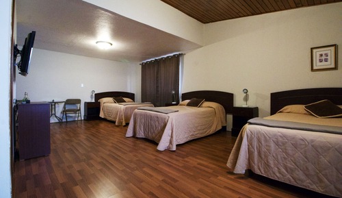 Habitación cuádruple familiar, varias camas
