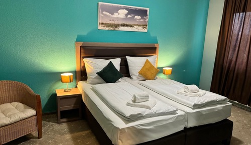 Habitación estándar con 1 cama doble o 2 individuales
