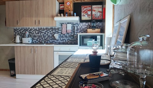 Estudio de diseño, cocina, entresuelo