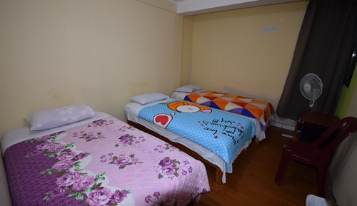 Habitación triple, baño compartido