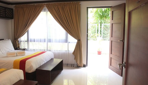 Habitación familiar, en la zona del jardín