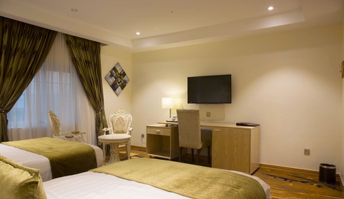 Habitación Deluxe con 2 camas individuales, varias camas