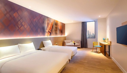 Habitación triple, varias camas