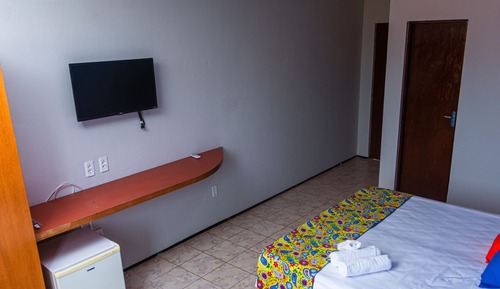 Habitación triple, varias camas