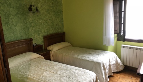 Habitación cuádruple, varias camas