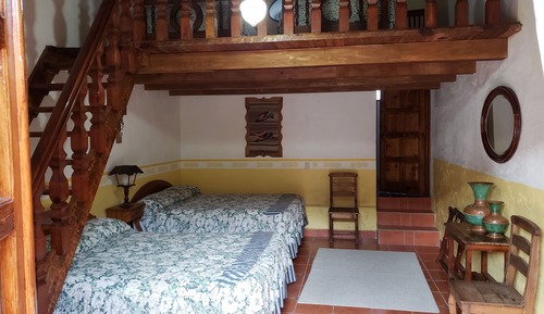 Habitación familiar, varias camas, no fumadores, vistas al jardín