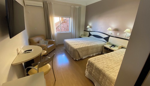 Suite superior, varias camas