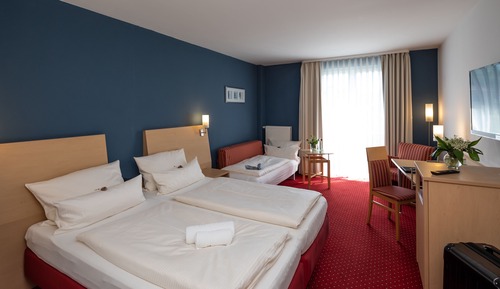 Habitación básica con 1 cama doble o 2 individuales, vistas a la ciudad