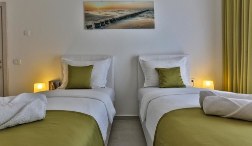 Habitación con 2 camas individuales, vistas al mar