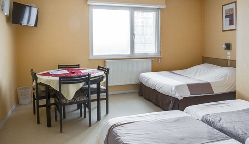 Habitación cuádruple, varias camas