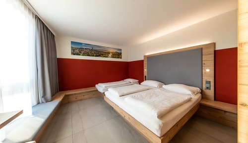 Habitación triple, vistas a la ciudad