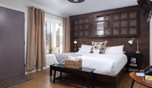 Habitación Signature, 1 cama de matrimonio grande con sofá cama, vistas al patio (1)