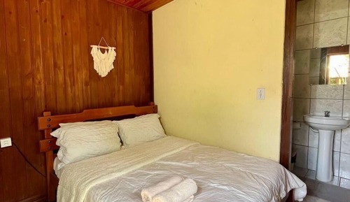 Suite económica, baño privado, en la zona del jardín