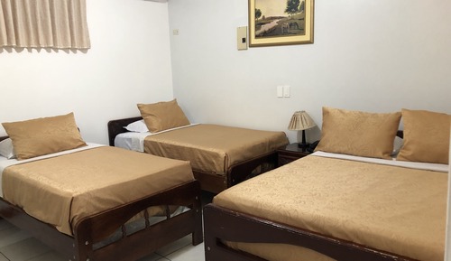 Habitación triple estándar, varias camas