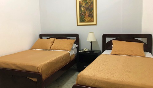 Habitación triple superior, varias camas