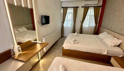 Habitación triple Deluxe