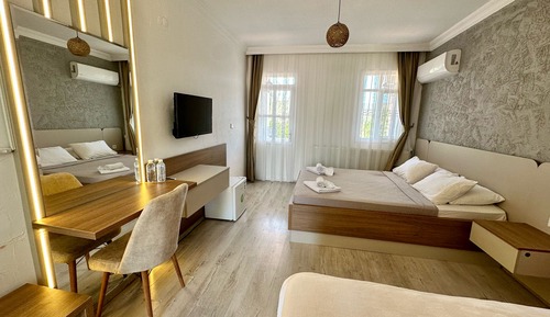 Habitación cuádruple Deluxe