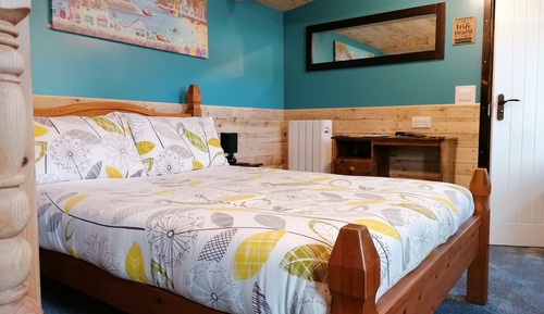 Habitación cuádruple familiar, varias camas, vistas al jardín, planta baja