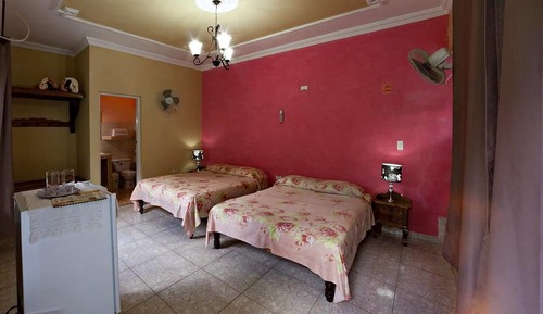Habitación cuádruple familiar, 2 camas de matrimonio, vistas al patio