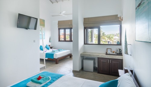 Habitación familiar, varias camas, vistas a la ciudad